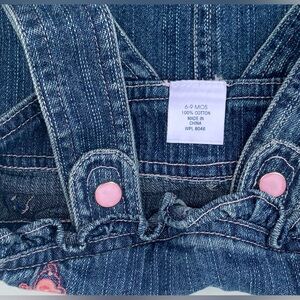 6-9 months girls denim dress with pink butterfly on it